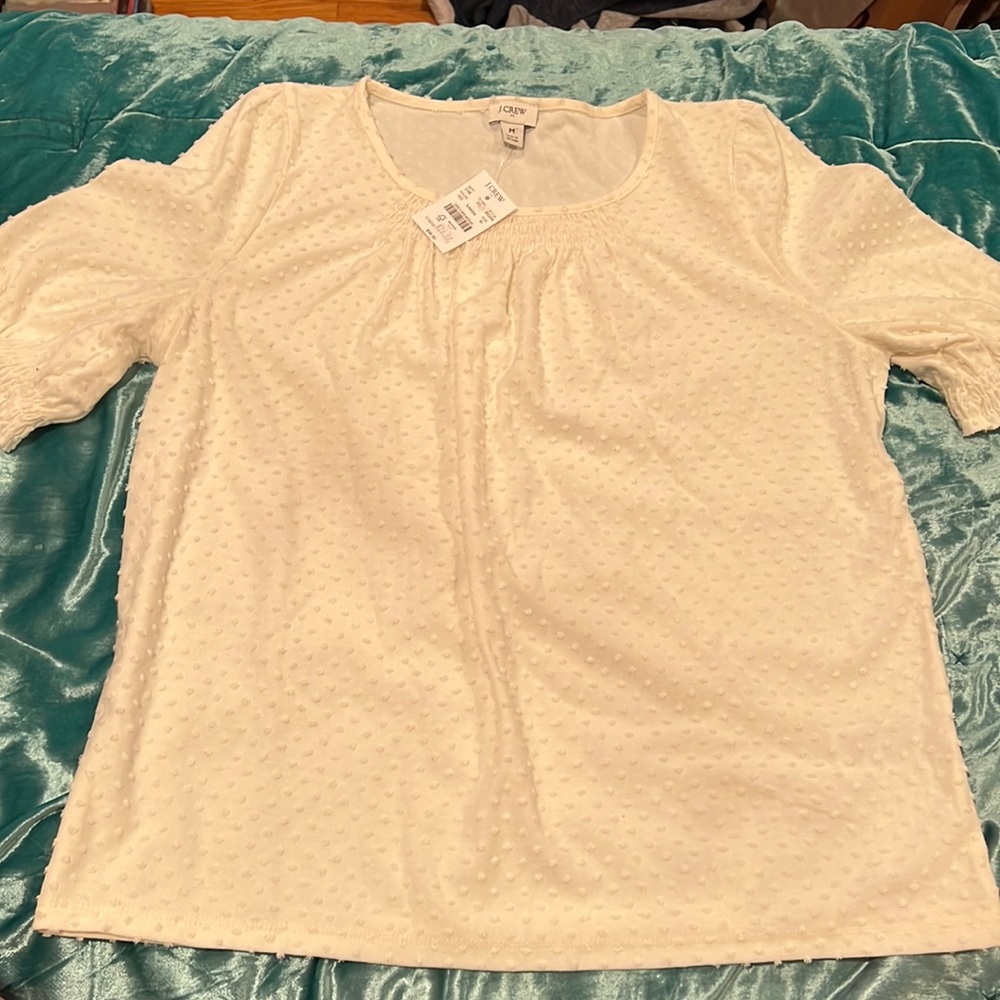 Jcrew white blouse in a size medium.
